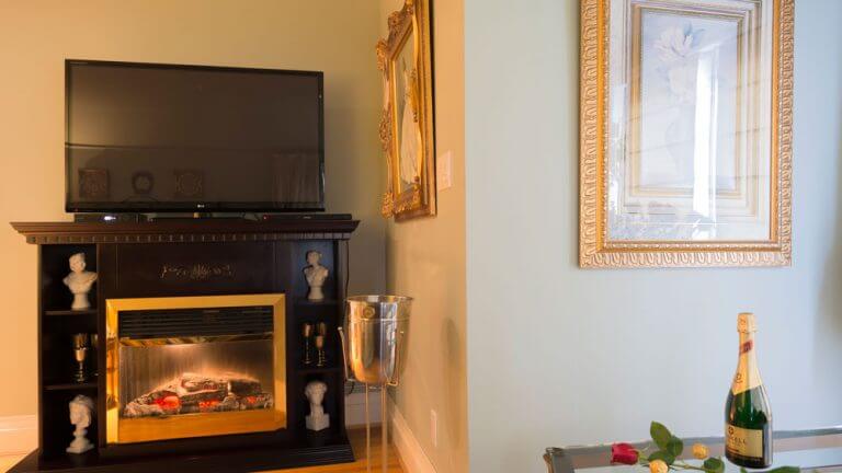 fireplace and tv in vivaldi suite